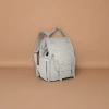 This white backpack is simple, versatile, lightweight and has a large capacity for student commuting and travel Specification image